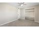 Bedroom with ceiling fan and closet with built-in shelving at 790 N Meadows Dr, Chandler, AZ 85224