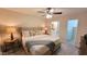 Bedroom featuring a cozy bed with views into the bathroom and walk-in closet at 7950 E Keats Ave # 150, Mesa, AZ 85209