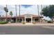 Exterior of the golf shop with palm trees and tile roof at 7950 E Keats Ave # 150, Mesa, AZ 85209