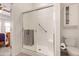 Bathroom featuring a glass-enclosed shower, toilet, and towel rack at 8142 S Open Trail Ln, Gold Canyon, AZ 85118