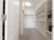 Spacious walk-in closet with ample shelving and storage space at 8142 S Open Trail Ln, Gold Canyon, AZ 85118