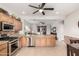 Well-lit kitchen with stainless steel appliances, tile backsplash, and open layout at 8142 S Open Trail Ln, Gold Canyon, AZ 85118