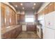 This kitchen includes stainless steel appliances, plenty of cabinet space, and a large window with natural light at 8142 S Open Trail Ln, Gold Canyon, AZ 85118