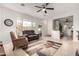 Inviting living room with hardwood floors and a comfortable seating arrangement at 8142 S Open Trail Ln, Gold Canyon, AZ 85118