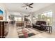 Bright living room with open floor plan and tile flooring at 8142 S Open Trail Ln, Gold Canyon, AZ 85118