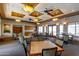 Spacious meeting room with plenty of tables and chairs and windows for natural light at 8142 S Open Trail Ln, Gold Canyon, AZ 85118