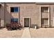 Inviting townhome featuring a stucco facade, complemented by mature landscaping and a cozy front entry at 8410 N 32Nd Ave, Phoenix, AZ 85051