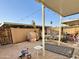 Covered patio with outdoor seating, string lights, and barbeque at 8410 N 32Nd Ave, Phoenix, AZ 85051