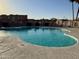 Inviting community pool with clear blue water and ample deck space for lounging at 8410 N 32Nd Ave, Phoenix, AZ 85051