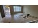 Bright living room with tile flooring, a large window, and an open entryway for a spacious feel at 8815 W Columbus Ave, Phoenix, AZ 85037