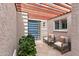 Relaxing courtyard featuring modern patio furniture and stylish pergola at 934 E Cochise Dr, Phoenix, AZ 85020