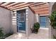 Inviting courtyard with unique pergola, textured walls, and private entrance at 934 E Cochise Dr, Phoenix, AZ 85020