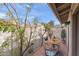 Private outdoor seating on brick patio, featuring table with wine glasses and lovely plants and landscaping at 934 E Cochise Dr, Phoenix, AZ 85020