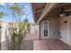 Covered patio with fan, plus private fenced outdoor space featuring mature trees, providing ideal outdoor space at 934 E Cochise Dr, Phoenix, AZ 85020