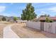 Charming street view of a home featuring stucco walls and a desert landscape with mountain views under a blue sky at 934 E Cochise Dr, Phoenix, AZ 85020