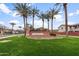 Beautiful community entrance with lush landscaping and a welcoming sign at 964 S Henry Ln, Gilbert, AZ 85296