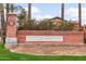 Close-up of the community entrance sign amidst manicured landscaping at 964 S Henry Ln, Gilbert, AZ 85296