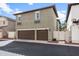 Two-story house with a tandem two-car garage and charming architectural details at 964 S Henry Ln, Gilbert, AZ 85296