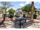 Inviting grilling area featuring built-in barbecue, seating, and covered gazebo in a well-maintained outdoor space at 964 S Henry Ln, Gilbert, AZ 85296