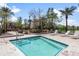 Relaxing hot tub area with lounge chairs and mature landscaping at 964 S Henry Ln, Gilbert, AZ 85296