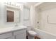 Bathroom featuring tiled floors, a shower and modern vanity at 9703 W Forrester Dr, Sun City, AZ 85351