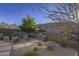 Beautiful backyard featuring desert landscaping, built-in barbecue, and private pool at 9785 E Preserve Way, Scottsdale, AZ 85262