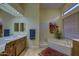 Luxurious bathroom with a soaking tub, dual sinks, and a serene ambiance at 9785 E Preserve Way, Scottsdale, AZ 85262