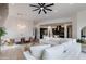 Spacious living room with an open floor plan, hardwood floors, and a smooth transition into the kitchen at 100 W Northern Ave # 17, Phoenix, AZ 85021