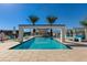 Stunning pool with resort-style cabanas and palm trees offers a luxurious outdoor experience at 100 W Northern Ave # 17, Phoenix, AZ 85021