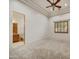 Bedroom featuring neutral carpet and an ensuite bath at 10396 N 133Rd St, Scottsdale, AZ 85259