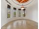 Bright, spacious dining area with coffered ceiling, tile flooring, and large windows at 10396 N 133Rd St, Scottsdale, AZ 85259