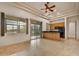 Spacious kitchen with stainless steel appliances, granite counters, and large windows at 10396 N 133Rd St, Scottsdale, AZ 85259