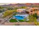 Amazing backyard with luxurious pool, spa, fire pit, and mountain views at 10396 N 133Rd St, Scottsdale, AZ 85259