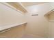Spacious walk-in closet with shelving for organization at 10726 W Pineaire Dr, Sun City, AZ 85351