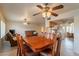 Open floor plan featuring a dining room adjacent to living room and kitchen at 10726 W Pineaire Dr, Sun City, AZ 85351