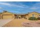 Inviting single-story home with low-maintenance desert landscaping, solar panels, and covered entryway at 10726 W Pineaire Dr, Sun City, AZ 85351