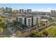 Modern apartment building with palm tree lined street and city view at 1130 N 2Nd St # 214, Phoenix, AZ 85004