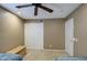 Neutral bedroom with a ceiling fan, a closet, and a separate door at 13214 S 39Th St, Phoenix, AZ 85044