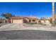Charming single-story home features a well-manicured front yard, desert landscaping and a tile roof at 13214 S 39Th St, Phoenix, AZ 85044