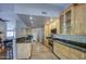 Spacious eat-in kitchen with stainless appliances, maple cabinets, and granite countertops at 13214 S 39Th St, Phoenix, AZ 85044