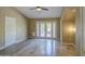 Large main bedroom features private access to the backyard, ceiling fan and tiled floor at 13214 S 39Th St, Phoenix, AZ 85044