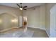 Large main bedroom features private access to the bathroom, ceiling fan and tiled floor at 13214 S 39Th St, Phoenix, AZ 85044