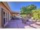 Spacious backyard patio area with comfortable seating, perfect for relaxation and enjoying the outdoor space at 13214 S 39Th St, Phoenix, AZ 85044