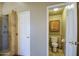 A toilet room and tiled shower room, separated with doors from the main bathroom, ensure privacy at 13214 S 39Th St, Phoenix, AZ 85044