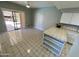 Bright eat-in kitchen with lots of space and a sliding glass door to the back yard at 13517 N 102Nd Pl, Scottsdale, AZ 85260