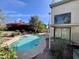 Enjoy this inviting pool surrounded by lush landscaping and a covered patio, creating a private backyard retreat at 13517 N 102Nd Pl, Scottsdale, AZ 85260