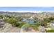 Aerial view of community lake with desert landscaping and mountain views at 15039 S 28Th St, Phoenix, AZ 85048