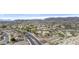 Scenic aerial view of a suburban neighborhood with desert landscaping and mountain backdrop at 15039 S 28Th St, Phoenix, AZ 85048