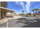A beautiful backyard features a covered patio and pristine pool area at 15039 S 28Th St, Phoenix, AZ 85048