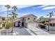 Charming two-story home featuring desert landscaping, a two-car garage, a tile roof and blue sky at 15039 S 28Th St, Phoenix, AZ 85048